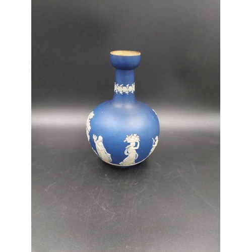 381 - A late 19th century dark blue Jasperware bottle neck vase with impressed marks 'B.P.C' and 'W', poss... 