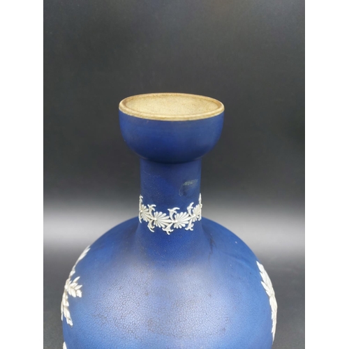 381 - A late 19th century dark blue Jasperware bottle neck vase with impressed marks 'B.P.C' and 'W', poss... 