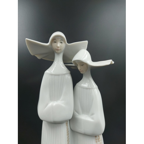 393 - A Lladro Two Nuns figurine model no. 4611 - approx. 33cm high