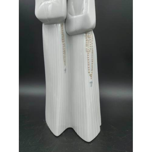 393 - A Lladro Two Nuns figurine model no. 4611 - approx. 33cm high