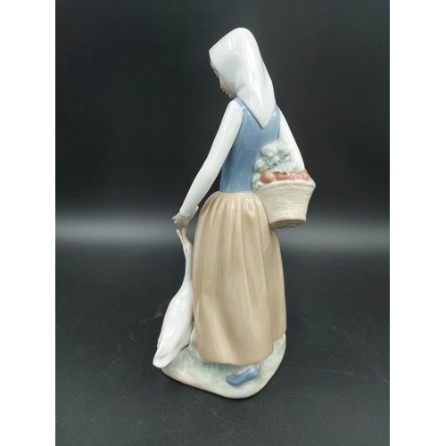 395 - Three various figurines, one Lladro Bashful Bather model no. 5455, one Nao Choir Boys ringing bell m... 