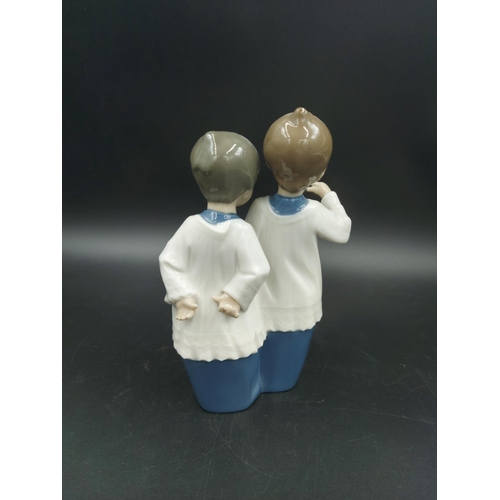 395 - Three various figurines, one Lladro Bashful Bather model no. 5455, one Nao Choir Boys ringing bell m... 