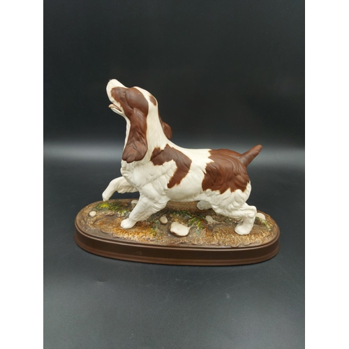 399 - A Beswick 'The Spaniel' matte porcelain figurine with stand - approx. 21cm high