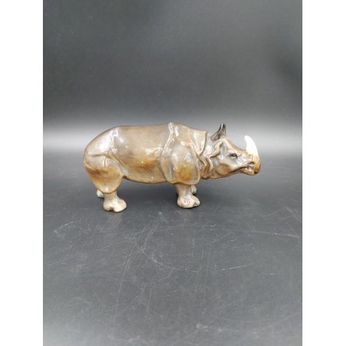 399A - An early Royal Doulton rhinoceros figurine signed to foot HN 141, circa 1923-1927 - approx. 8.5cm hi... 