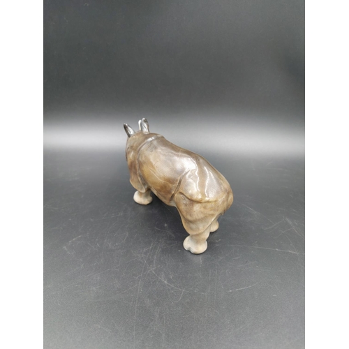 399A - An early Royal Doulton rhinoceros figurine signed to foot HN 141, circa 1923-1927 - approx. 8.5cm hi... 