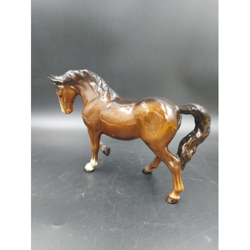 402 - Two Beswick brown horse figurines, one Stocky Jogging Mare and one Foal