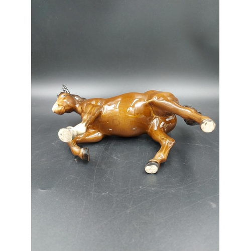 402 - Two Beswick brown horse figurines, one Stocky Jogging Mare and one Foal