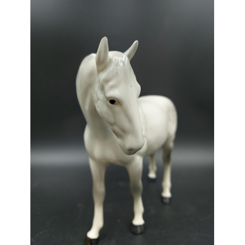 405 - A Beswick Dapple Grey horse figurine - approx. 17cm high x 23cm long