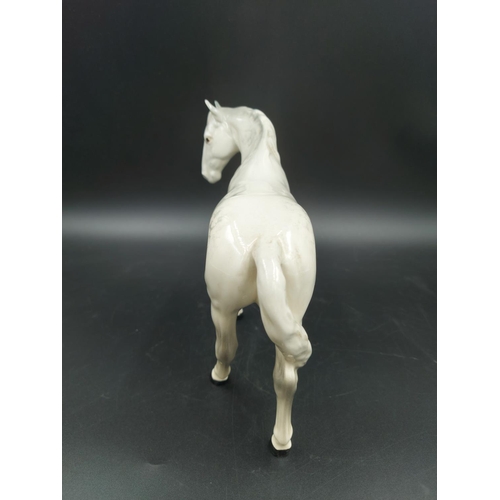 405 - A Beswick Dapple Grey horse figurine - approx. 17cm high x 23cm long