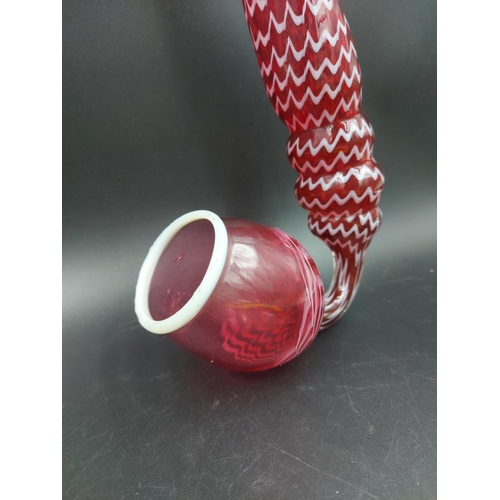 408A - A 19th century Nailsea cranberry and white swirl glass pipe - approx. 38cm long