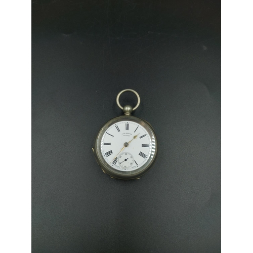 212 - A J.W. Reeves of Bawtry white metal pocket watch - approx. 8cm high x 5cm diameter