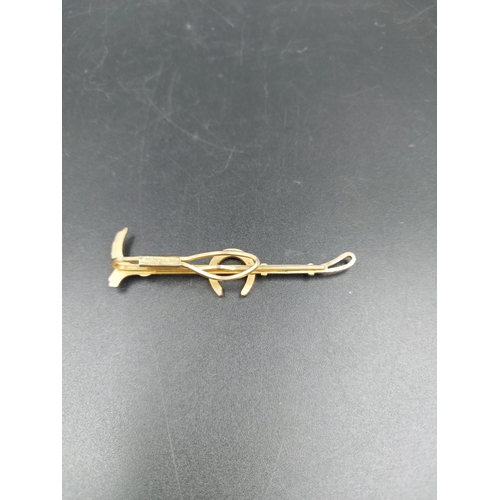 227 - A vintage Stratton Imitation horse riding crop and shoe tie clip