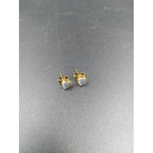 236 - A pair of stamped 9ct gold heart shaped aquamarine stud earrings - approx. gross weight 1 gram