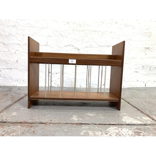 637 - A 1960s teak magazine rack - approx. 38cm high x 51cm wide x 18cm deep