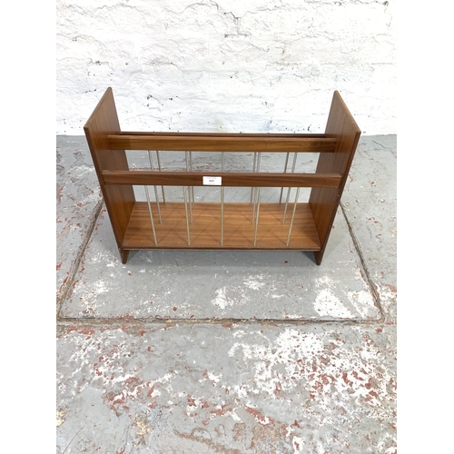 637 - A 1960s teak magazine rack - approx. 38cm high x 51cm wide x 18cm deep