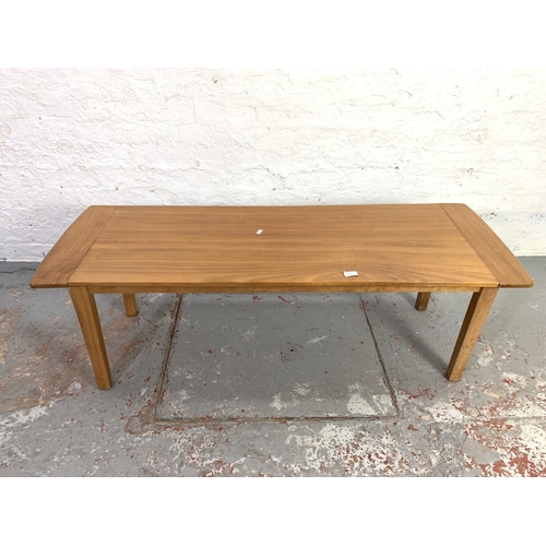 640 - A 1960s teak rectangular coffee table - approx. 43cm high x 128cm long x 44cm wide