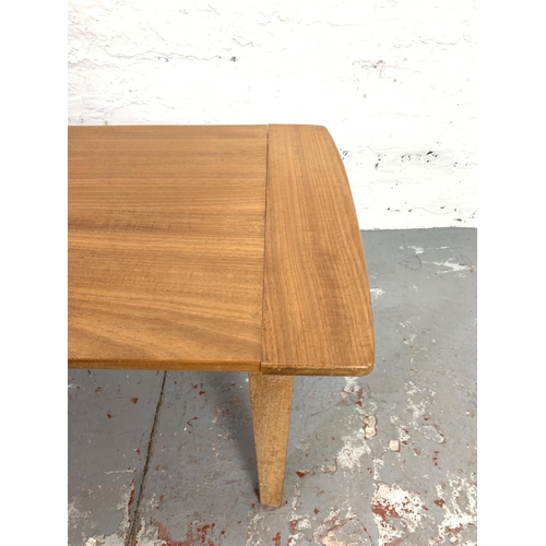 640 - A 1960s teak rectangular coffee table - approx. 43cm high x 128cm long x 44cm wide