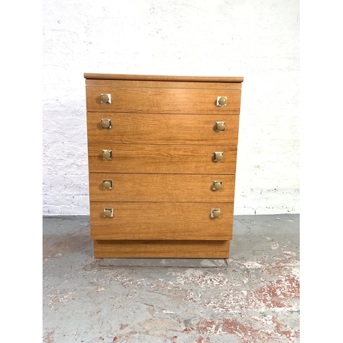 649 - A Schreiber teak effect chest of five drawers - approx. 103cm high x 80cm wide x 42cm deep