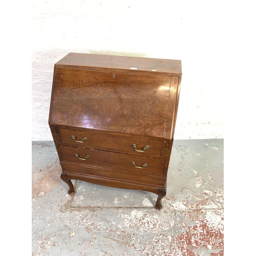 667 - A Georgian style walnut and mahogany bureau - approx. 104cm high x 76cm wide x 44cm deep