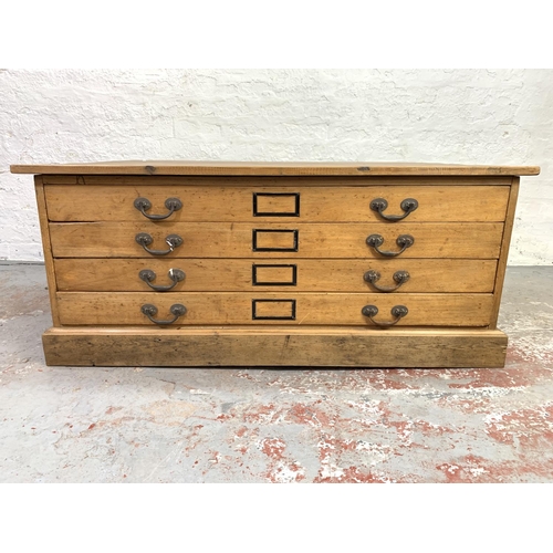 674 - A Victorian pine four drawer plan chest - approx. 52cm high x 122cm wide x 93cm deep