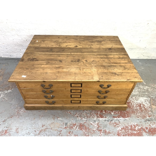 674 - A Victorian pine four drawer plan chest - approx. 52cm high x 122cm wide x 93cm deep