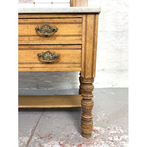 680 - A Griddle & Smith of Truro Aesthetic movement satinwood and oak washstand with white marble top and ... 