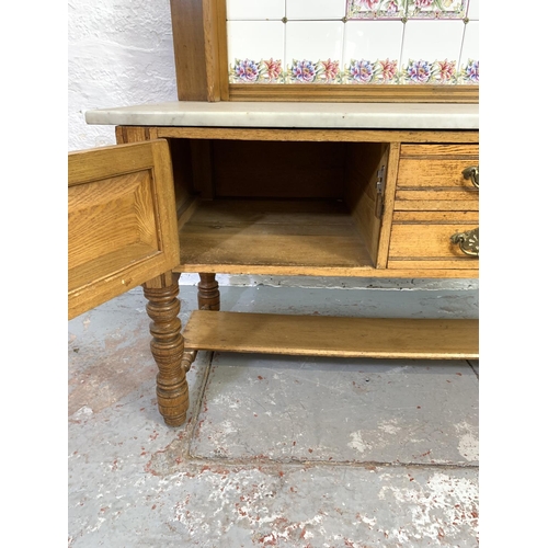 680 - A Griddle & Smith of Truro Aesthetic movement satinwood and oak washstand with white marble top and ... 