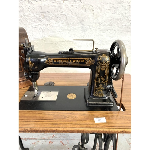 684 - A 19th century Wheeler & Wilson No. 12 treadle sewing machine - serial no. 112499