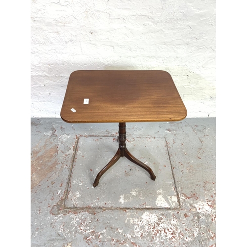 686 - A 19th century mahogany tilt top tripod table - approx. 68cm high x 55cm long x 40cm wide