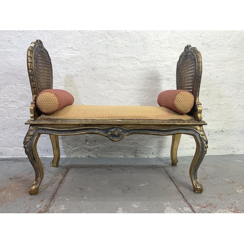 696 - A French Louis XV style giltwood window seat with rattan sides - approx. 88cm high x 94cm wide x 44c... 