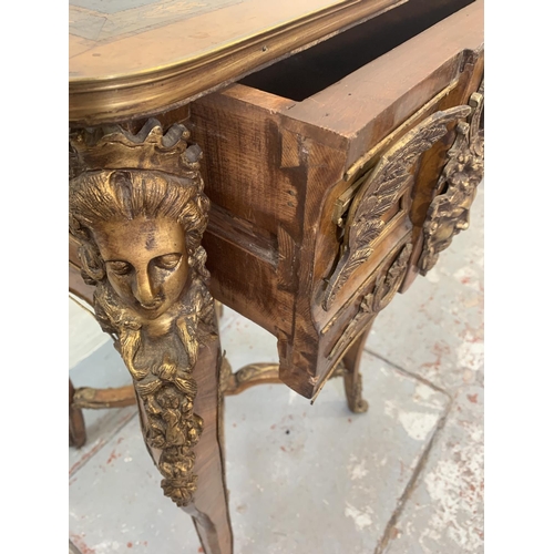 698 - A French Louis XV style inlaid walnut centre table with gilt metal relief - approx. 90cm high x 50.5... 