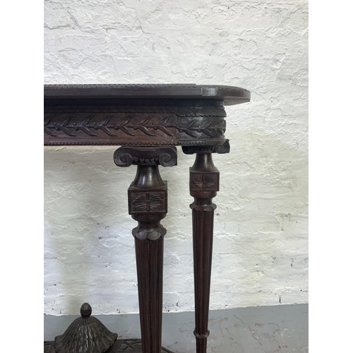 703 - A 19th century carved mahogany console table on fluted supports - approx. 89cm high x 95cm wide x 38... 