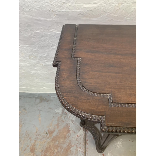 703 - A 19th century carved mahogany console table on fluted supports - approx. 89cm high x 95cm wide x 38... 