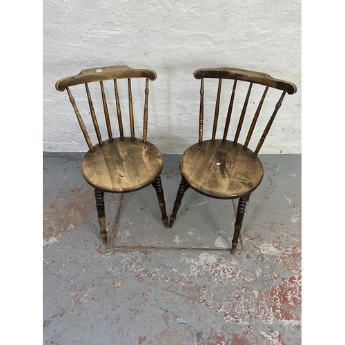 706 - Two Victorian style mahogany circular seated spindle back dining chairs