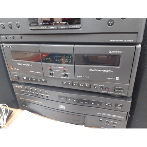 1030 - A Sony LBT-D307CD compact stereo hi-fi system comprising CDP-C322M five disc CD player - made in Jap... 