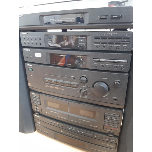 1032 - A Sony LBT-D359 midi stereo hi-fi system comprising HTC-D359 five disc CD player/twin cassette deck ... 