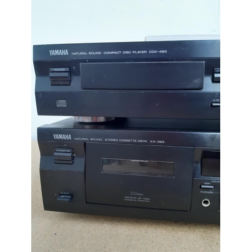 1042 - Two items of Yamaha stereo hi-fi, one CDX-493 CD player with instruction manual and one KX-393 casse... 