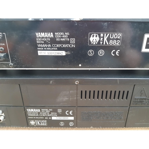 1042 - Two items of Yamaha stereo hi-fi, one CDX-493 CD player with instruction manual and one KX-393 casse... 