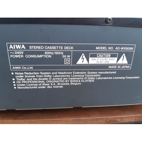 1044 - Two items of vintage stereo hi-fi, one Aiwa AD-WX808K cassette deck and one Realistic STA-64 two ban... 