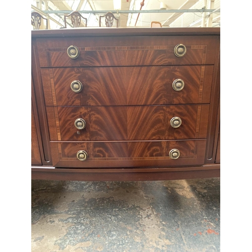 721 - A Strongbow mahogany sideboard with two doors, four drawers and fluted supported - approx. 86cm high... 