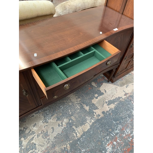 721 - A Strongbow mahogany sideboard with two doors, four drawers and fluted supported - approx. 86cm high... 