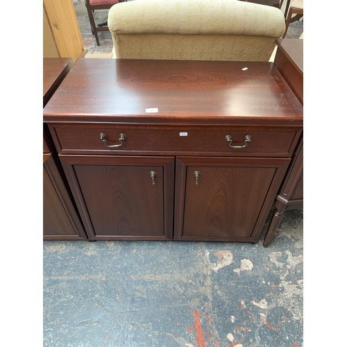 724 - A mahogany cabinet with two lower doors and one drawer - approx. 77cm high x 82.5cm wide x 44cm