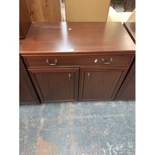 725 - A mahogany cabinet with two lower doors and one drawer - approx. 77cm high x 82.5cm wide x 44cm