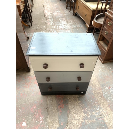 755 - A modern black, grey and white painted pine effect chest of three drawers - approx. 72cm high x 63cm... 