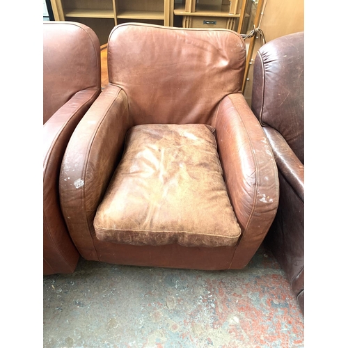 768 - A pair of Habitat brown leather armchairs with one matching stool