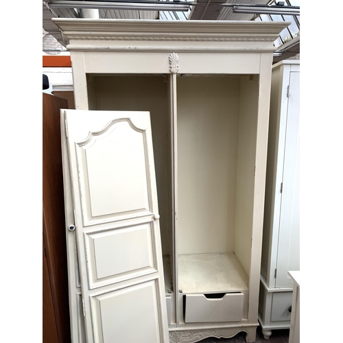 771 - Five pieces of modern painted furniture comprising cream painted double wardrobe, white painted doub... 