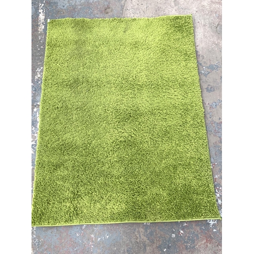 782 - A modern Kala green shaggy rug - approx. 160cm x 120cm