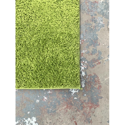 782 - A modern Kala green shaggy rug - approx. 160cm x 120cm