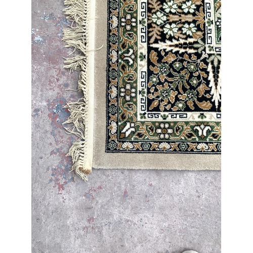 788 - A Woodward Grosvenor Wilton Persian style carpet - approx. 344cm x 274cm