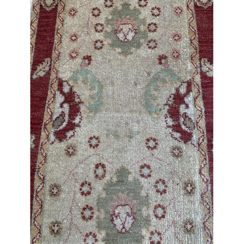 789 - A late 20th century cream and red hall runner - approx. 390cm x 79cm